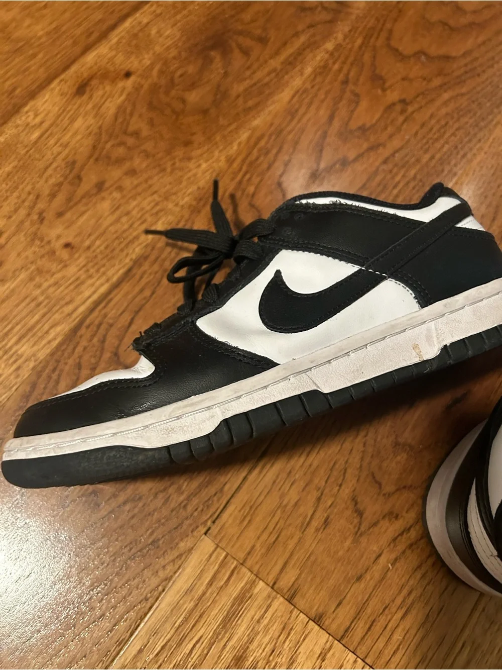 Nike Black and White Low-Top Sneakers – Classic Swoosh